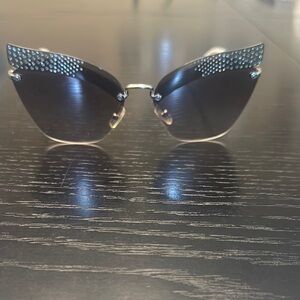Miu Miu Black Cat-Eye Sunglasses with Embellished Design